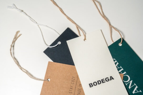 A neatly folded lingerie item with a branded hangtag, ready for packaging.